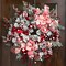 Northlight Heavily Flocked Pine with Candy Cane Striped Ornaments Christmas Wreath - 28" - Unlit